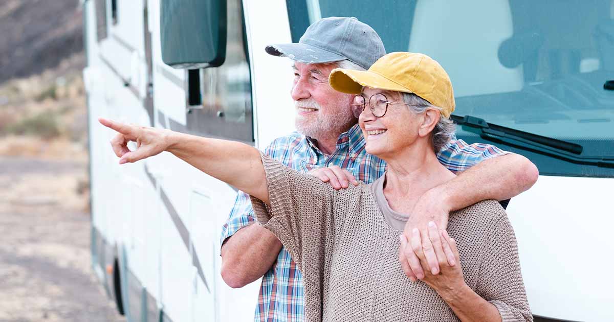 couple stopping on road trip to look at views